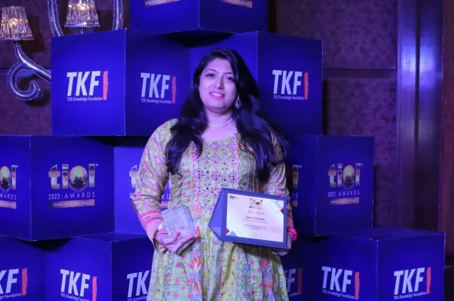 PracticeGuru receiving the TIOL 2023 award